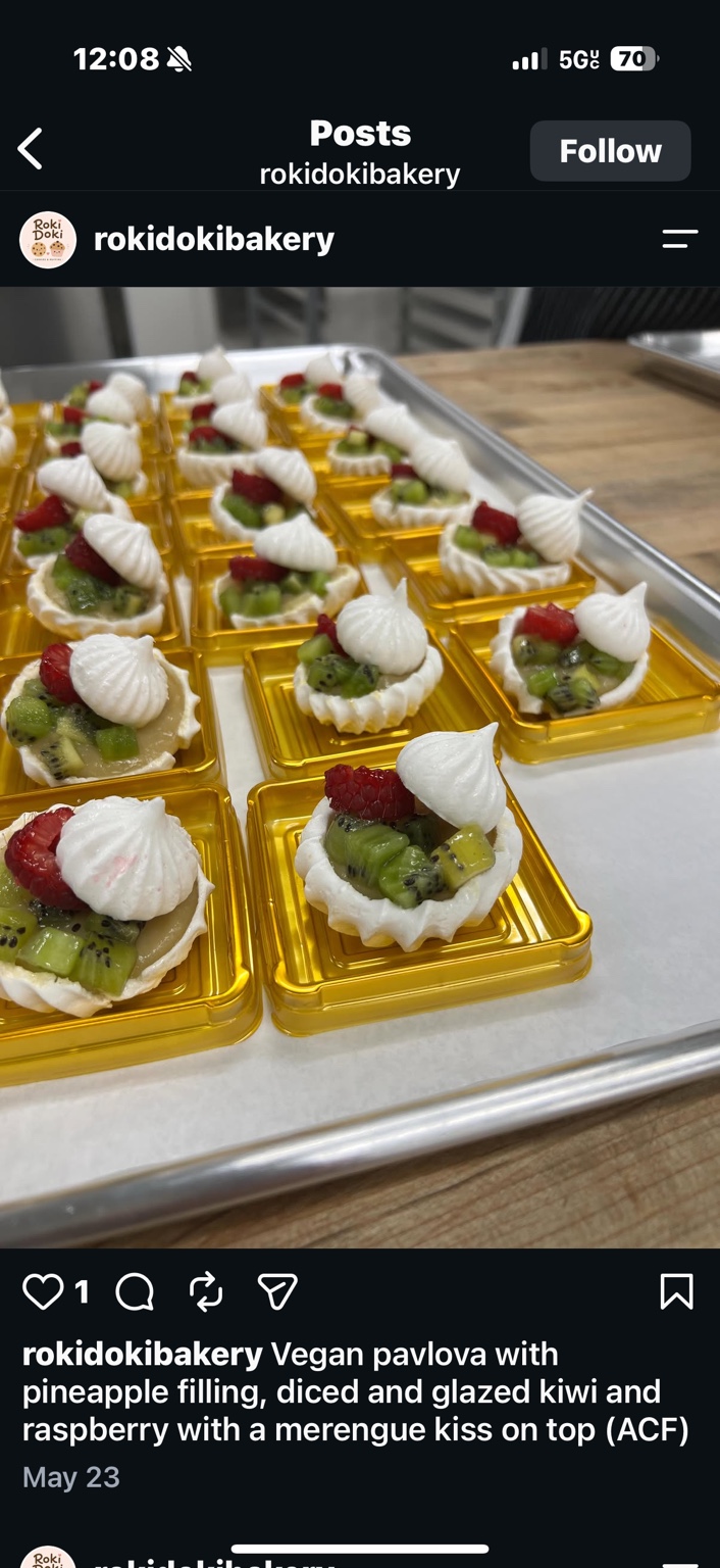 Pavlovas with pineapple filling, kiwi, raspberry and meringue kisses